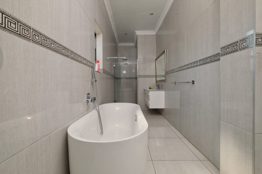 pexels-photo-20763300 A bathroom with a tub and a shower